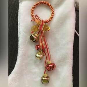 Festive Jingle Bell Ornament with Red and Gold Accents